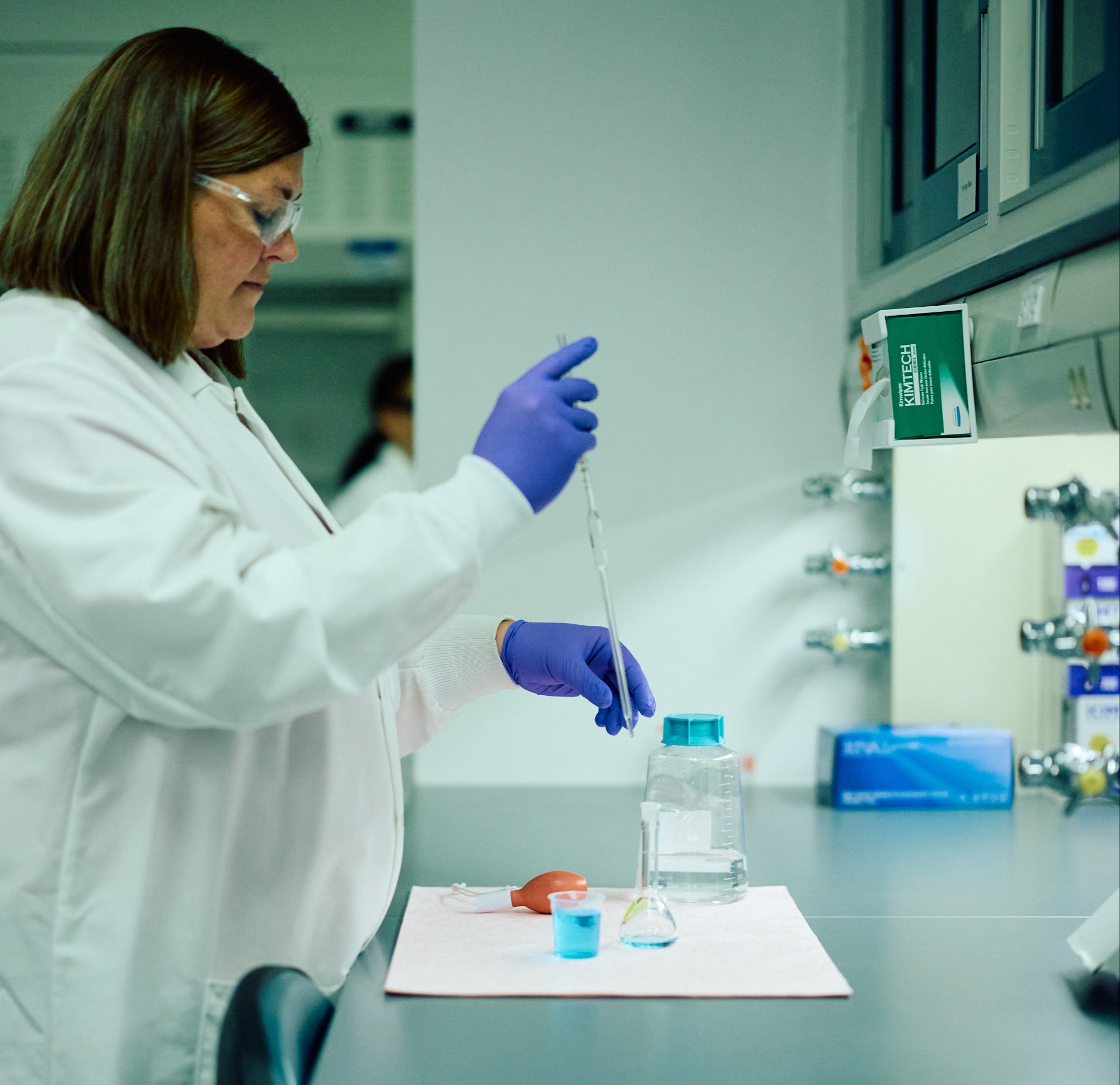 Scientist pipetting 